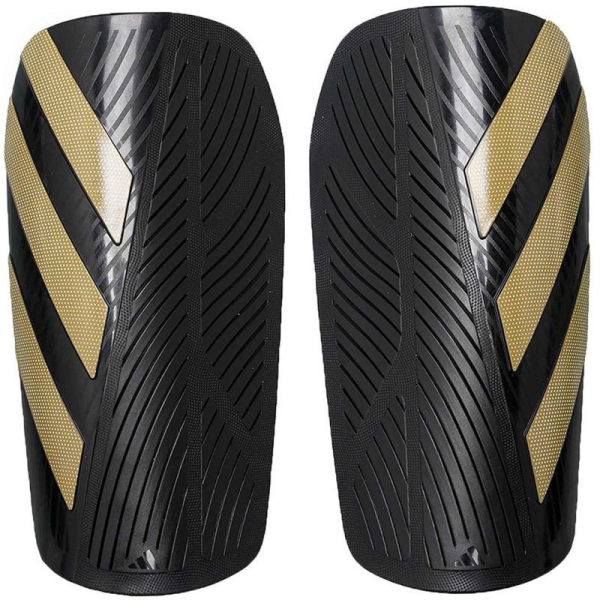 Adidas TIRO SG EU CLUB futbola aizsargi, melnā un zelta krāsā Adidas TIRO SG EU CLUB futbola aizsargi, melnā un zelta krāsā